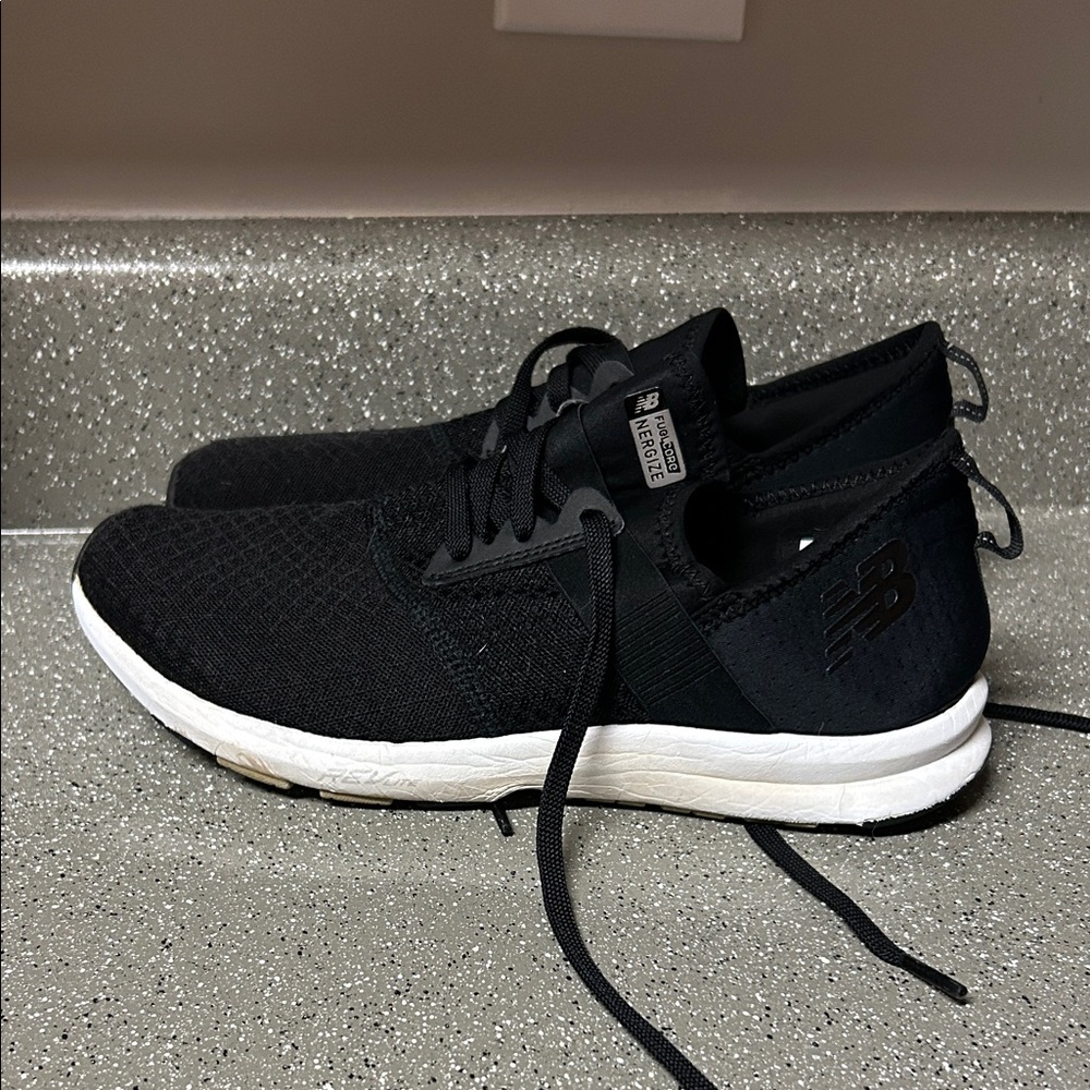 New Balance womens Black and White Sneakers